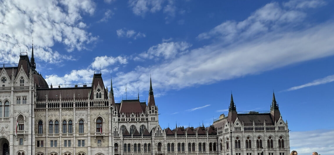 View of the Parliament building in Budapest with blue sky.