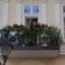 Single balcony on a historic Budapest building façade