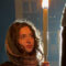 Young woman holding a torch during Budapest's commemorations of the Hungarian Revolution of 1956.